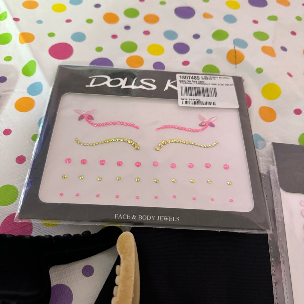 dolls kill pink and yellow butterfly eye gems